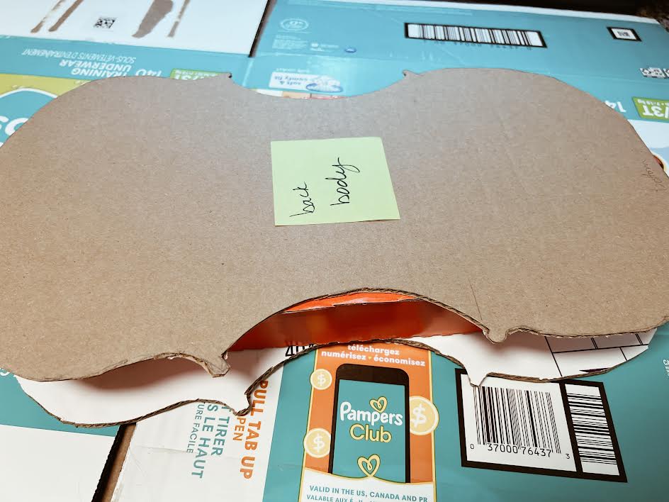 cardboard cello body with a box between the front and back for depth