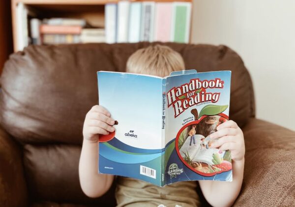 Preschooler reading Handbook for Reading