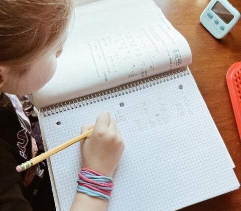 homeschool student at desk working on math homework