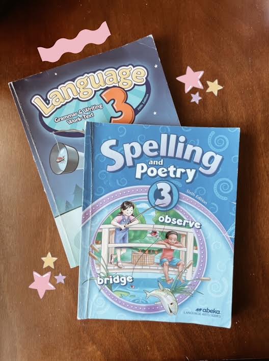 covers of abeka language and spelling for third grade being reviewed